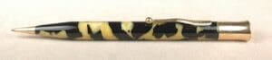 Black and yellow patterned pen with clip.