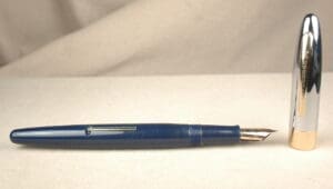 Blue fountain pen with a silver cap.