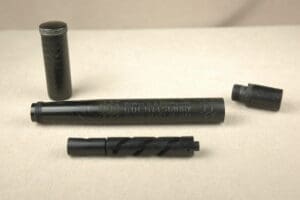 Disassembled pen with visible internal parts.