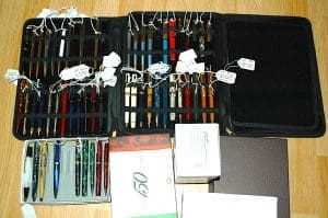 Collection of assorted pens with price tags.
