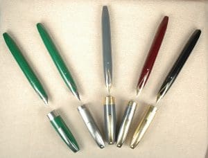 Colorful pens arranged in a semicircle pattern.