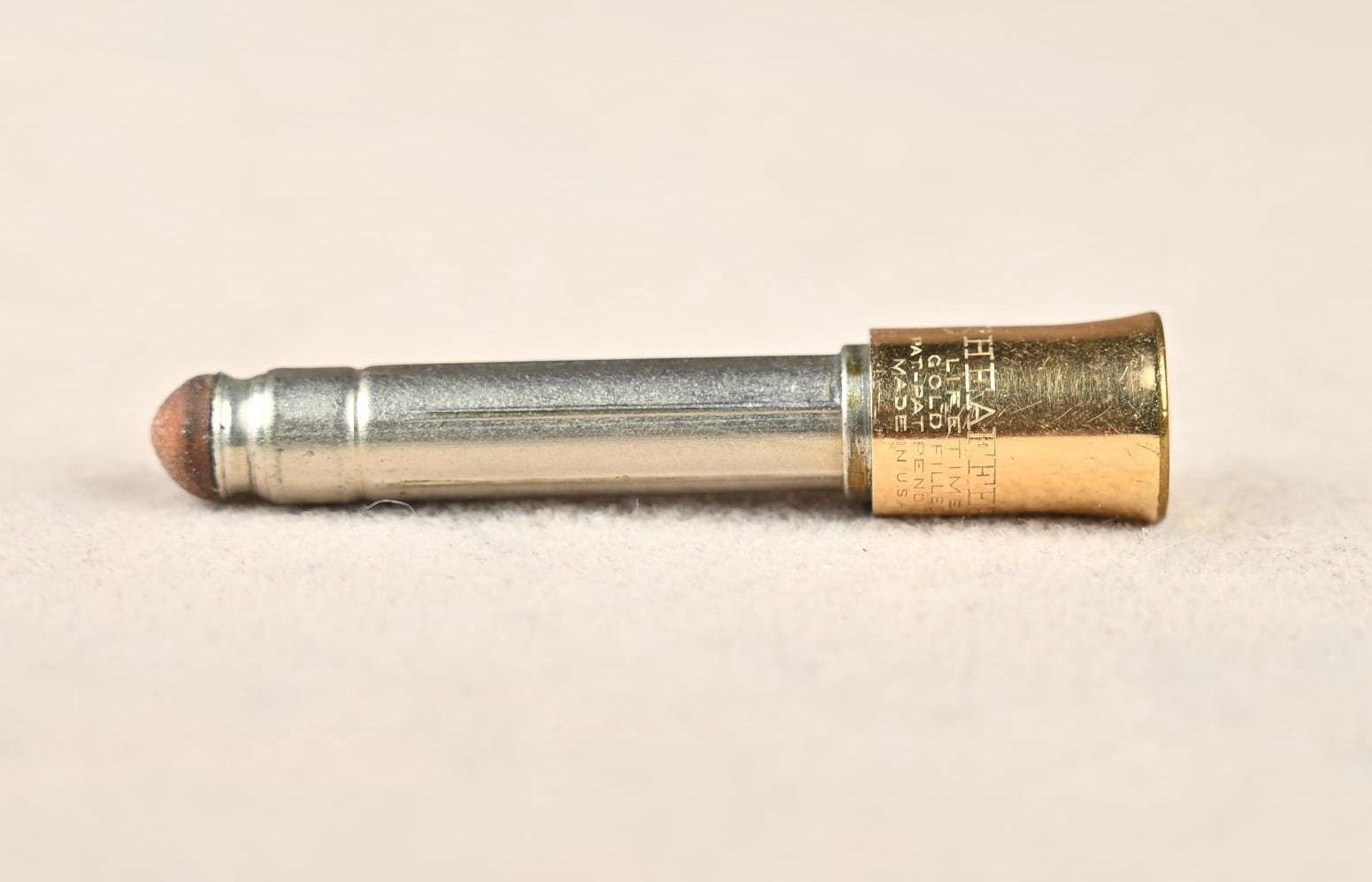 Sheaffer spare-lead and eraser holder.