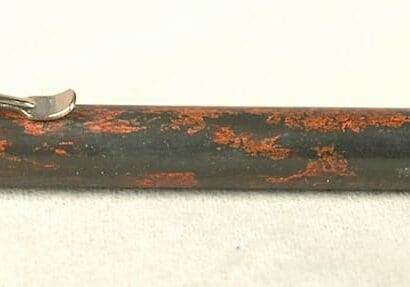 Antique gold mechanical pencil, copper accents.
